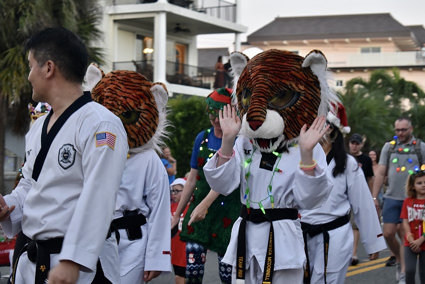 Red Tiger Martial Arts walk along Ocean Boulevard.