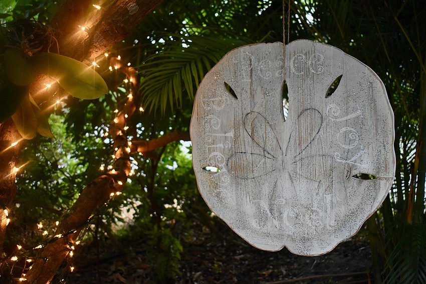 Lights and ornaments decorate the Longboat Island Chapel's garden.