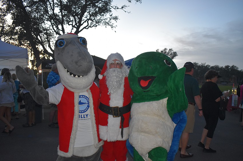Gilly, Santa and Shelley. Rotary's Nancy Rozance plays Santa for the evening.