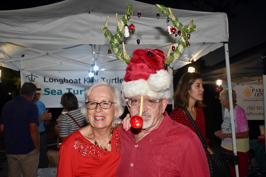 Joanne and Larry Wilhelm get in the Christmas spirit.