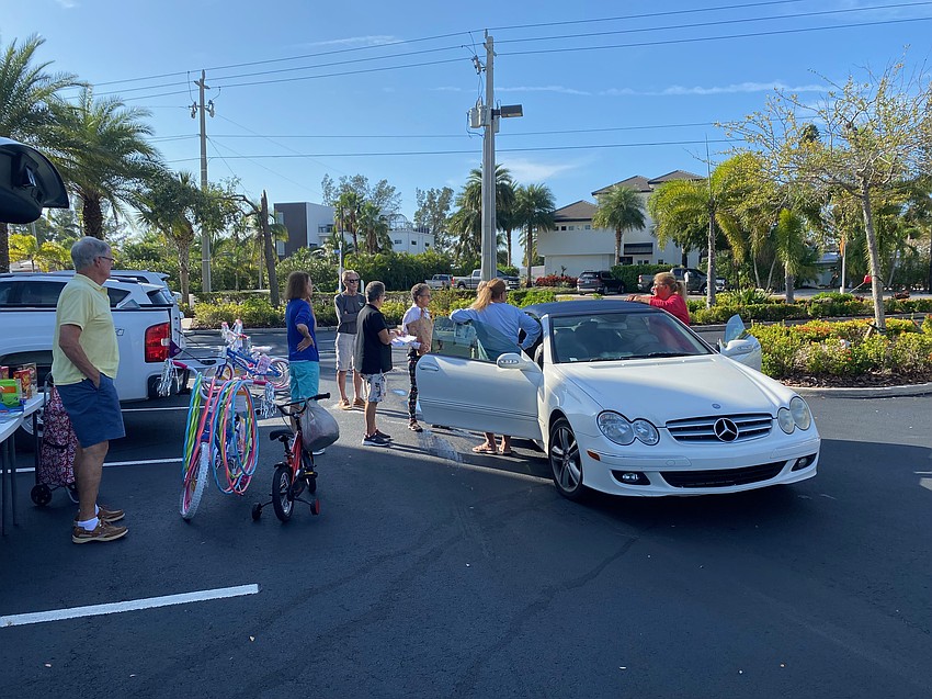 Christ Church holds a drive-thru toy and food drive on Wednesday.