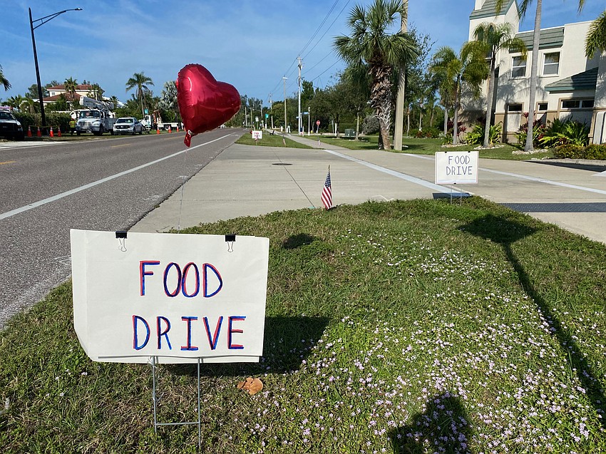 Christ Church sets up a food and toy drive in their parking lot on Wednesday morning.