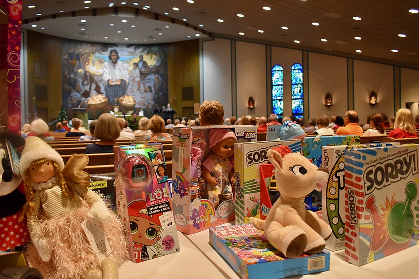 The cost of a concert ticket is one unwrapped gift for Catholic Charities.