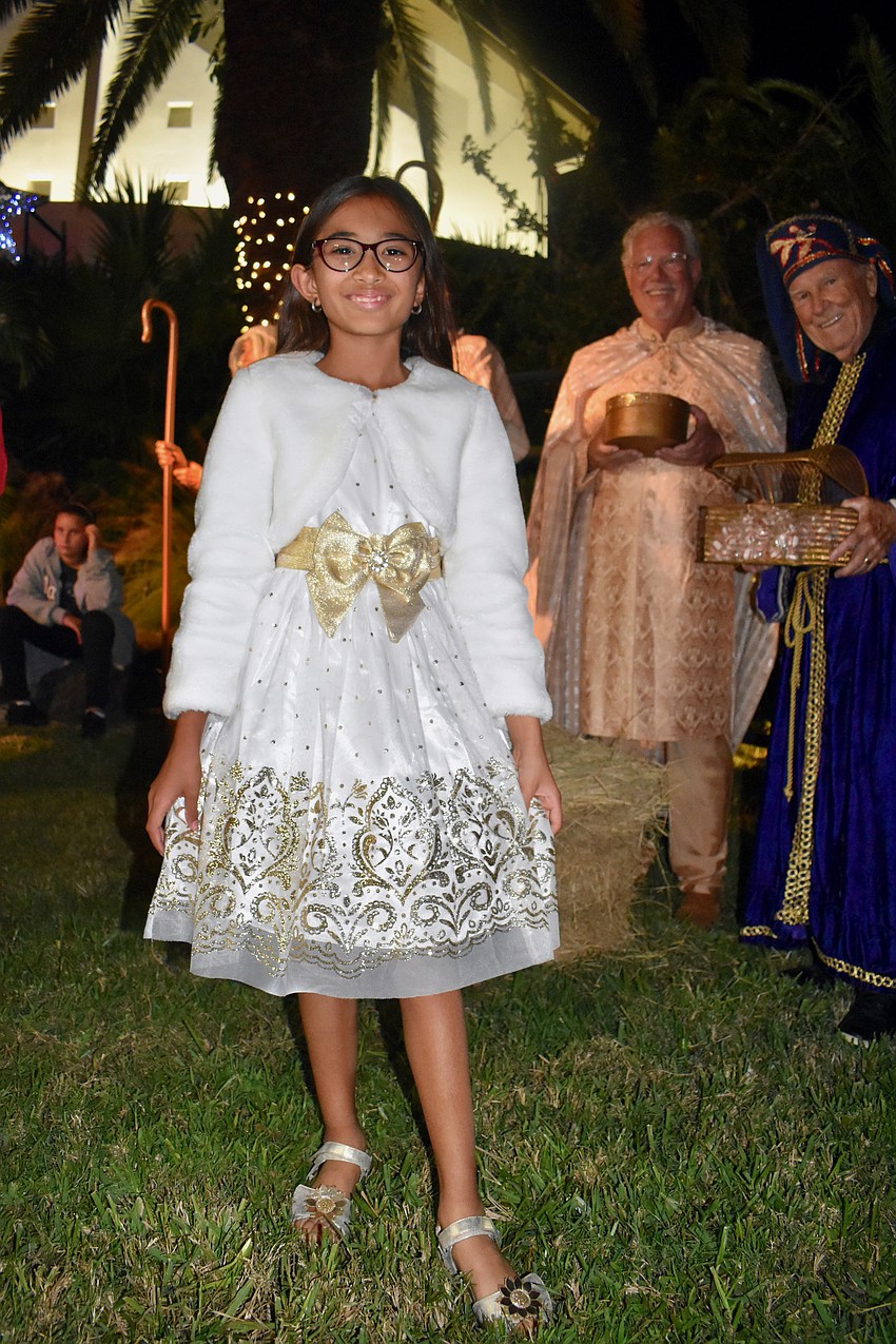 Aarya Strnad steps out in a snow princess dress.
