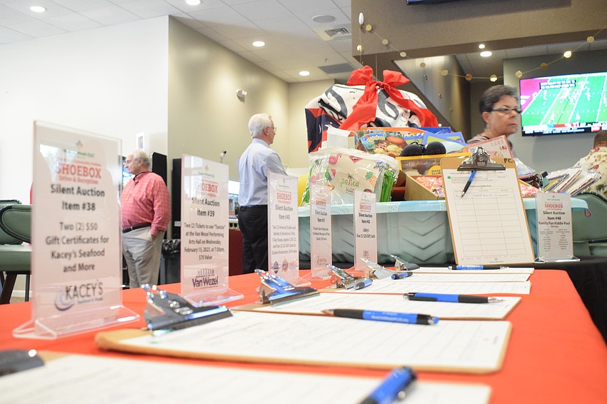 Silent auction items included a kiddie pool filled with toys, gift cards to Libby's, a massage and foot scrub and Universal Studios day passes.