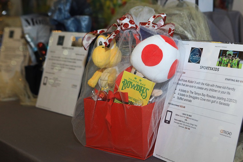 Guests bid on silent auction items.