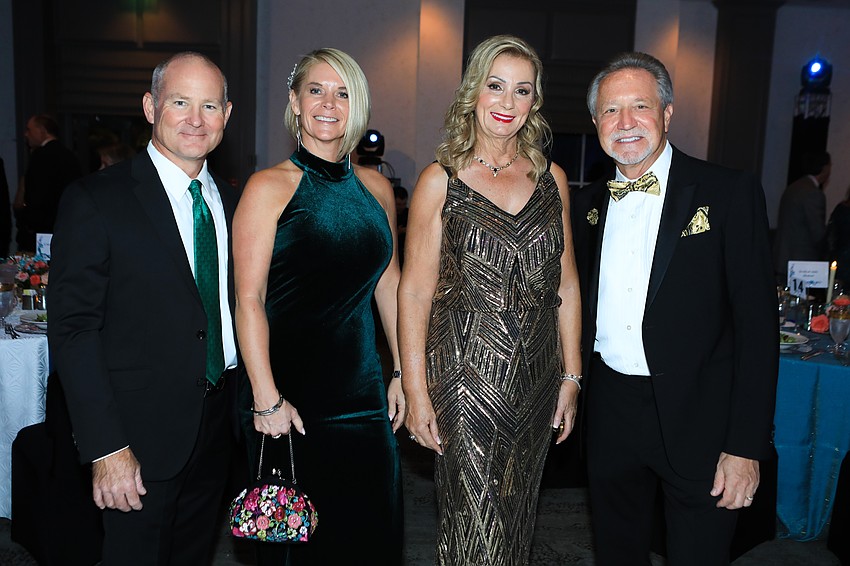 Co-chairs Jessica and Larry Lawman with Sandy and Mike Humenik