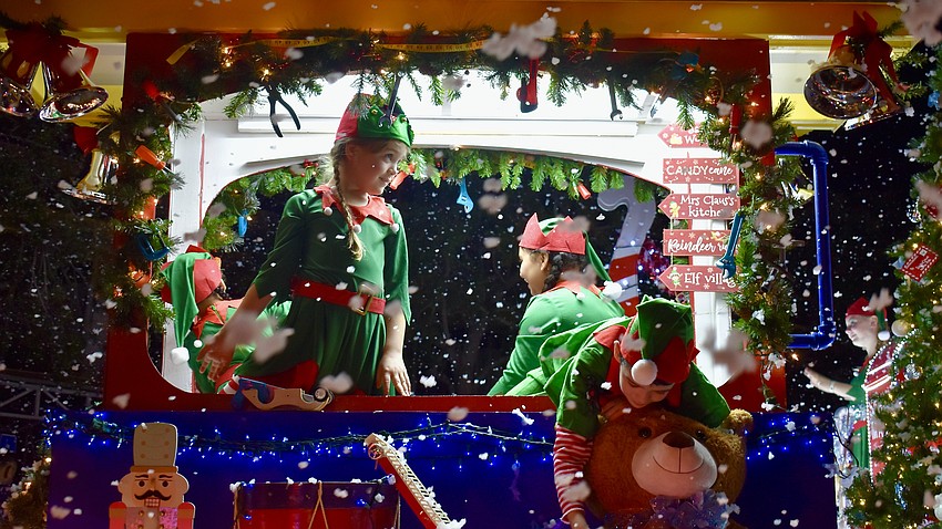 Brooklyn Athridge, Santana Leyva, Sofia Leyva and AJ Athridge ride with Stage Door Studios float.