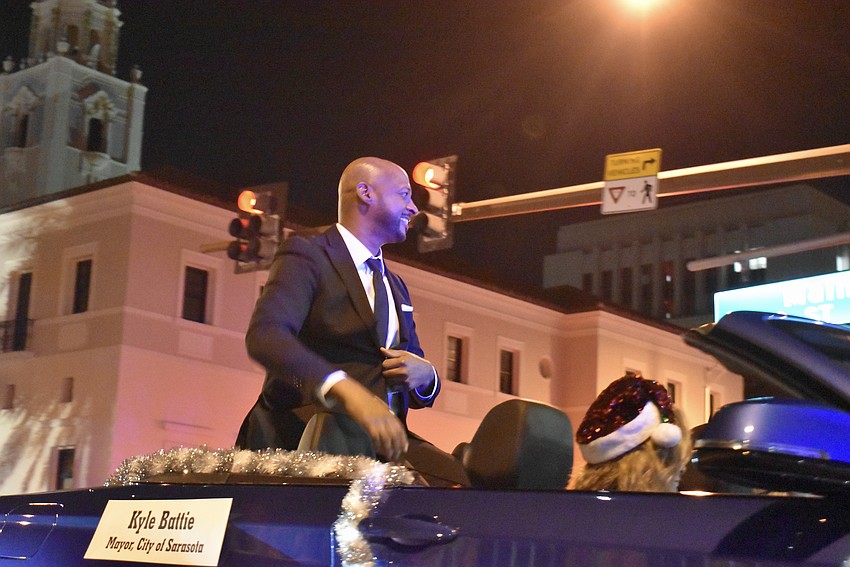 City of Sarasota Mayor Kyle Battie smiles at the Sarasota parade goers.