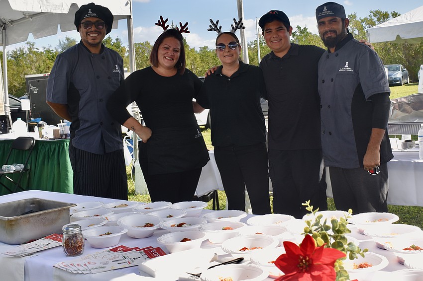 The staff at La Norma serving up 600 meatballs: Christopher Martinez, Amanda Mockenhaupt, Paula Mattern, Garrett Helms and Chef Manny Rodriguez.