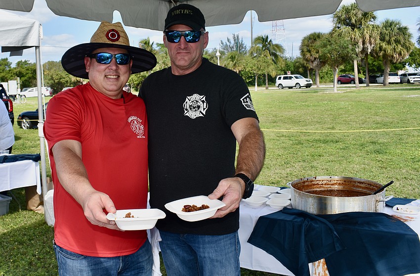 Jason Berzowski and Tim Haas of the Longboat Key Fire Rescue serve up their award-winning firehouse chili.