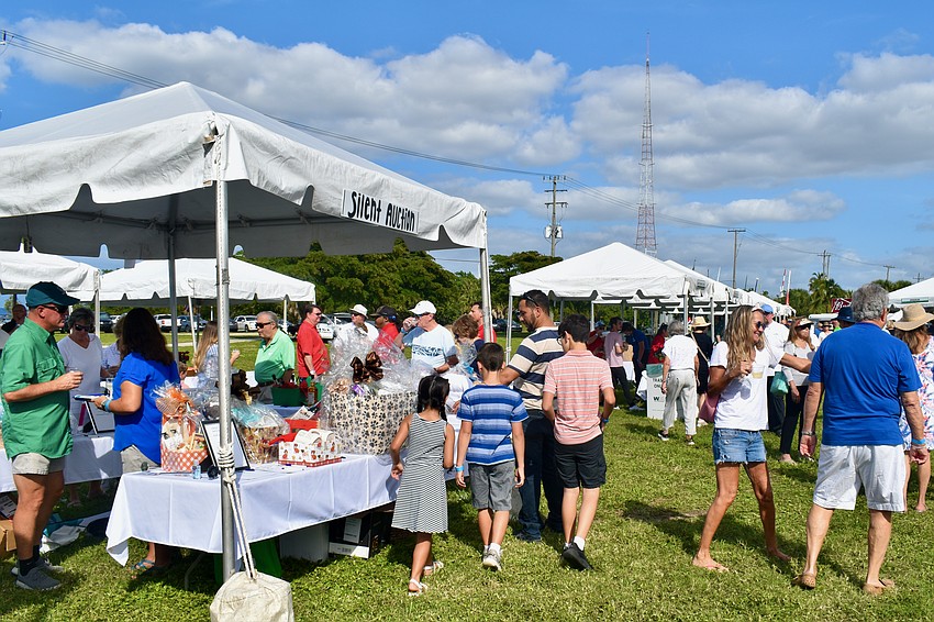 Guests check out the silent auction items.