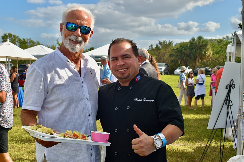 Rick Rone and Chef Roberto Dominguez, Rone is a fan of Columbia's 1905 salad.