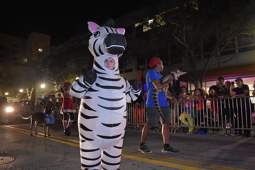 Max Estrada shows his zebra muscles.