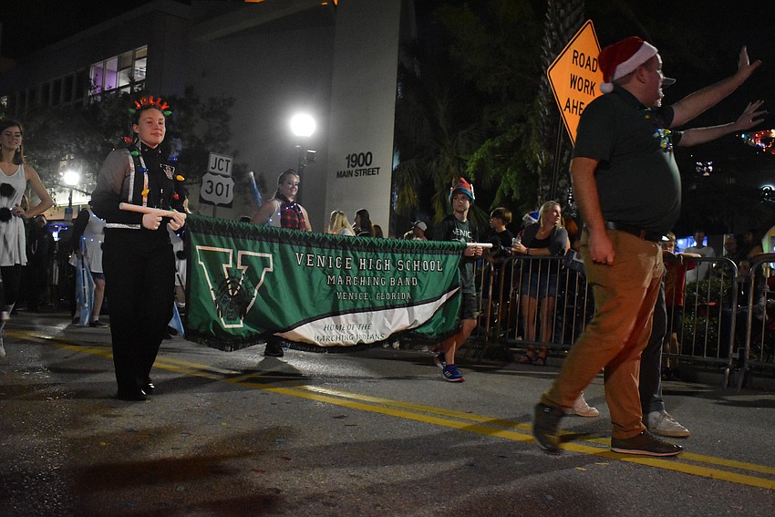 Venice High School Marching Band make their way down Main Street.