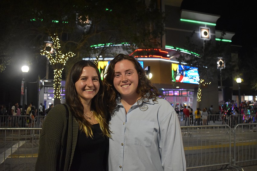 Kayla Sitton and Kaelyn Conaway in awe of the ending of the Sarasota Holiday Parade.