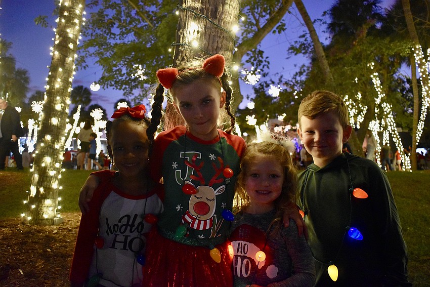 Eden Williams, Rian Dunn, Jane Goins and Lincoln Dunn are excited for the St. Armands tree lighting.