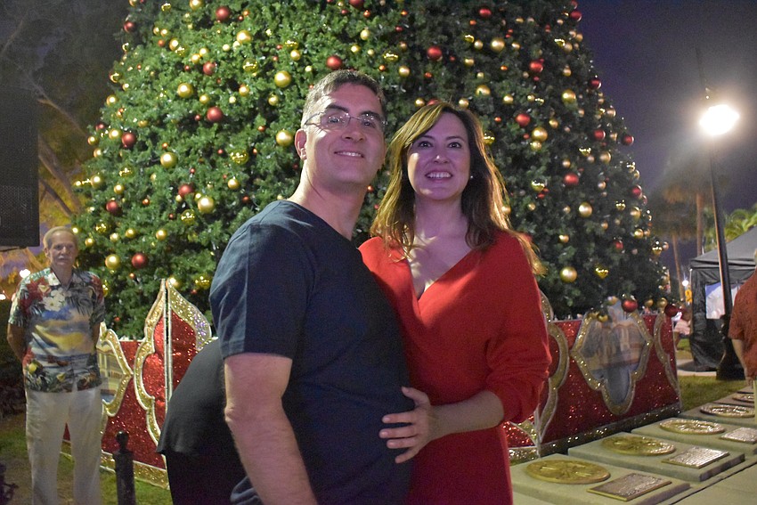 Mark Checcone and Kate Haris wait eagerly for the tree lighting and their daughter's performance in Future of Dance.
