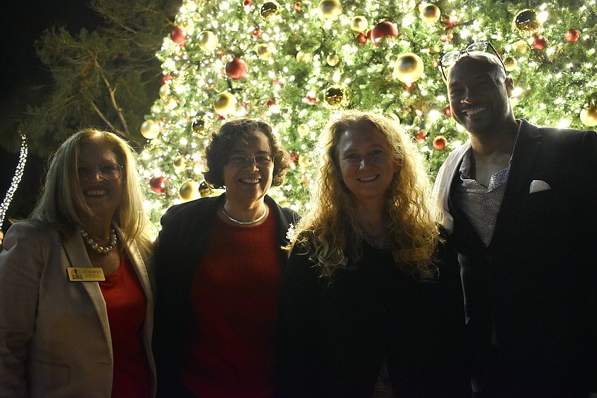 Vice Mayor Liz Albert, City Commissioner Debbie Trice, City Commissioner Jen Ahearn-Koch and Mayor Kyle Battie pose in front of the St. Armands tree.