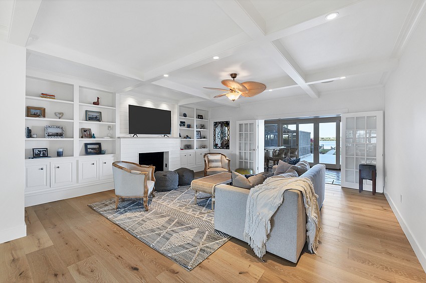 The main living area overlooks 115 feet of bay frontage.