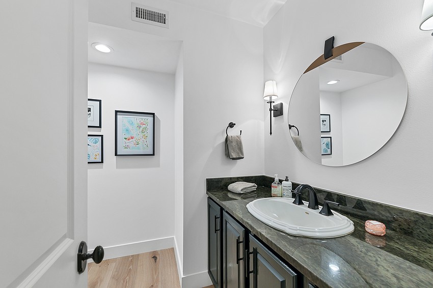 The home has five bedrooms and 4.5 baths.