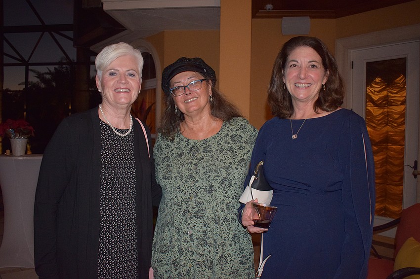 Concession's Deanna Murchie and Sarasota's Holly Elmore and Jan Pitchford enjoy talking to each other and meeting other people at the event.