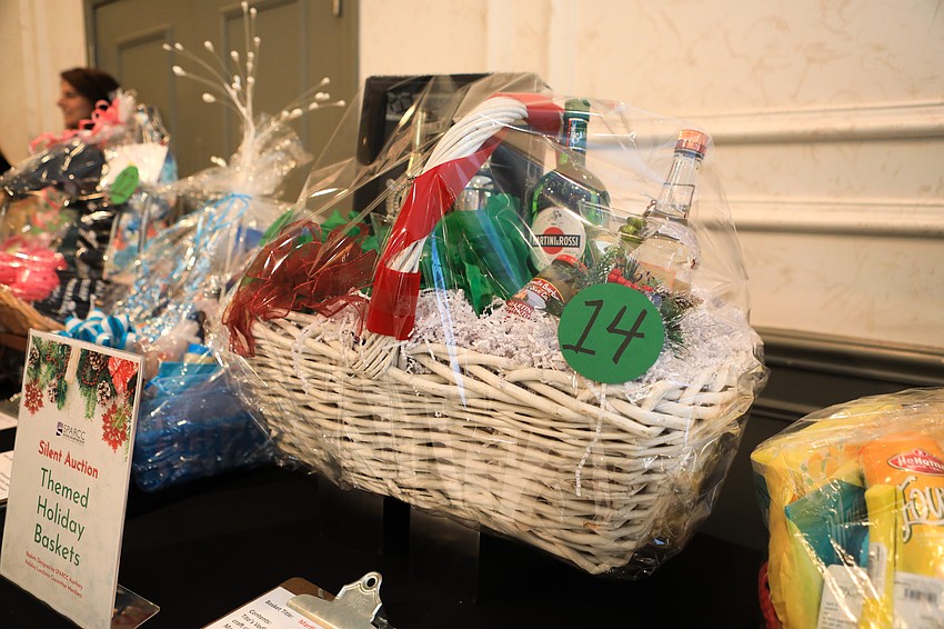 Guests looked at theme baskets designed by SPARCC Auxiliary committee members.