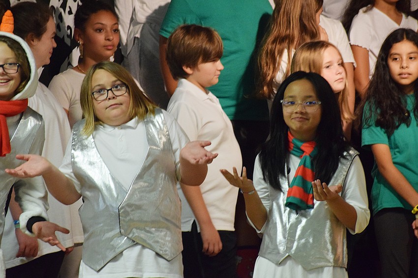 Fifth graders RJ Griffis and Kaitlyn Do act confused during the play.
