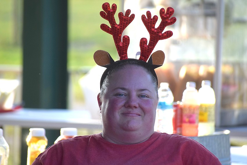 Volunteer Jolene Bryant gets in the spirit during a special holiday event at Herrmann's Royal Lipizzan Stallions.