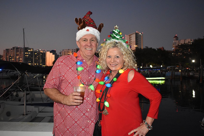 Mark and Victoria Strosser make way toward Bayfront Park.