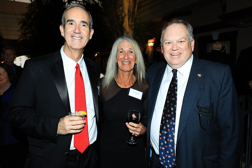Dr. Reuben and Tony Holland with Sarasota Memorial Hospital CEO David Verinder