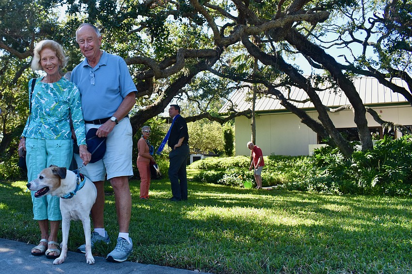 Diana Emerich-Cable and Rev. Fred Emerich with their dog Gustie