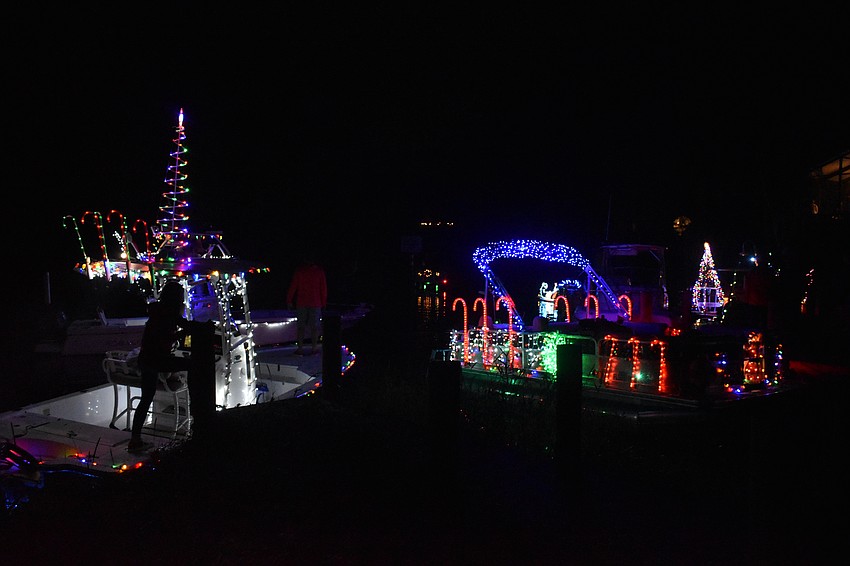 A variety of boats dock at Linger Lodge.