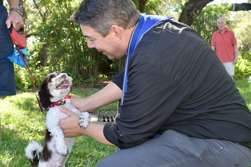 Paco and Rev. David Marshall share a moment.