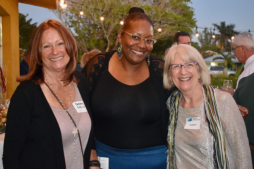 Massage therapists Debby Debile, Brandy Mixon and Liz Yerkes