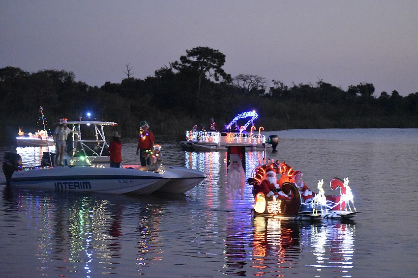 The parade approaches the shore.