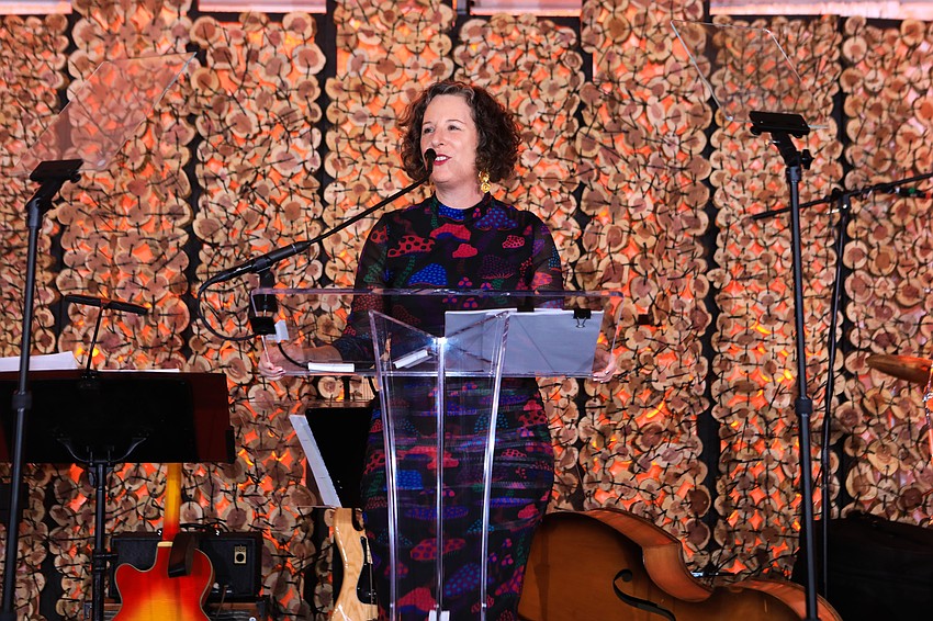 Executive Director Virginia Shearer welcomes the audience.