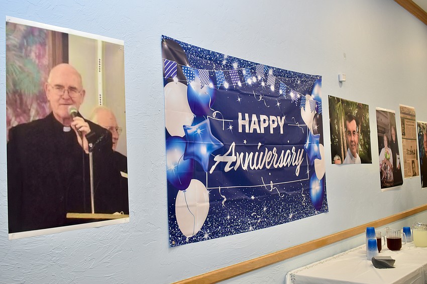 Photos of the current and former priests decorate Pick Hall.
