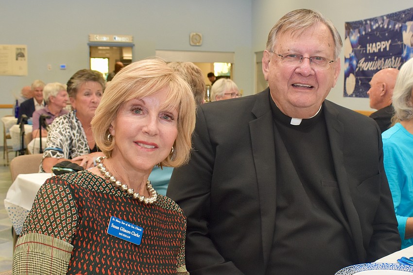 Susan Gilmore-Clarke and Father Phillip Schweda