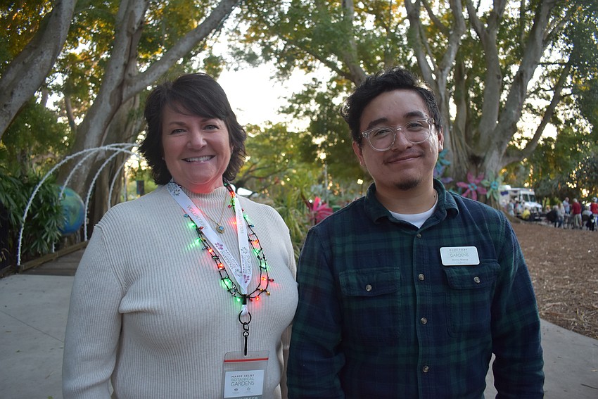 Lisa Wagner and Danny Blanco greet the guests into the garden.