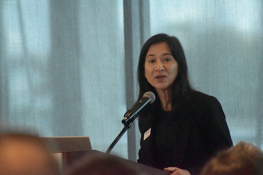 Incoming Executive Director Cintia Elenstar presents to the Longboat Key Democratic Club members.