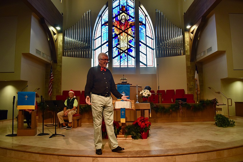 Pastor Norman Pritchard welcomes the children, teachers and parishioners.