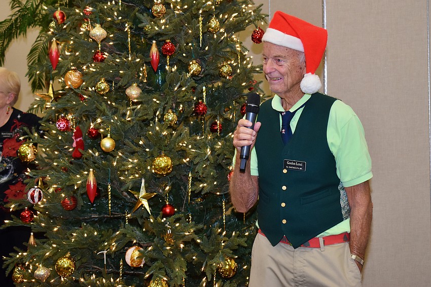Gordon Lenci readies the crowd for a sing-a-long of 