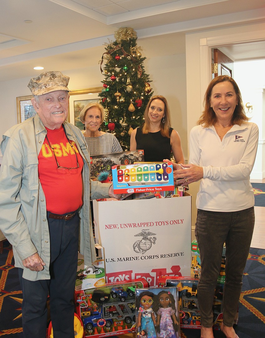 Retired USMC Veteran and BKYC member Rob Harlan, BKYC Commodore Lisa Adams, BKYC member  Dr. Janet Allgair  and BKYC  general manager Tammy Hackney