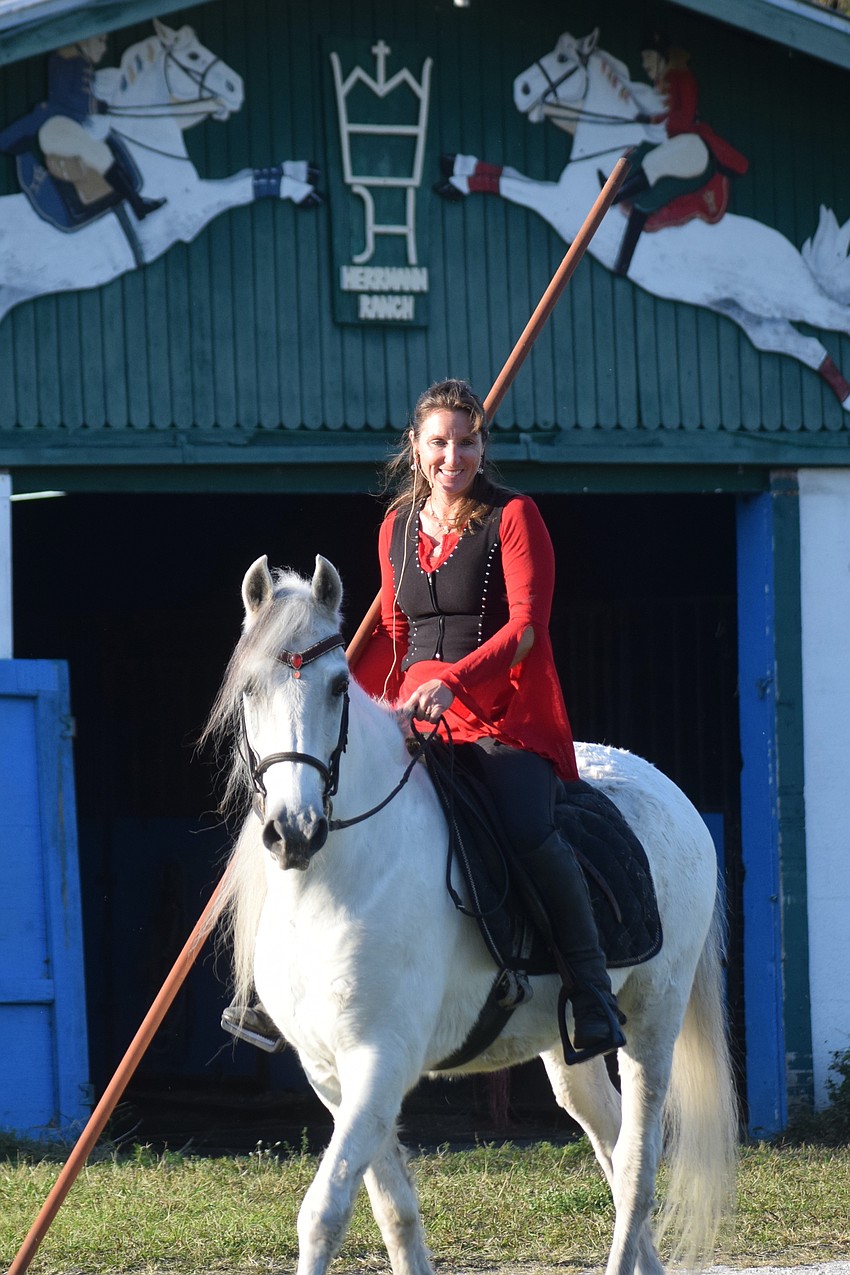 Rebecca McCullough and Achilles head for a makeshift arena for an exhibition during a special Christmas event Saturday. The event returns Sunday from 3-6 p.m. and then returns the following Saturday and Sunday.
