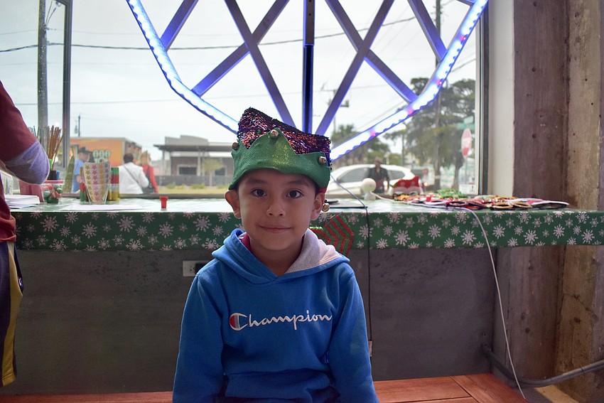 Jesus Resendiz decorates his letter to Santa.