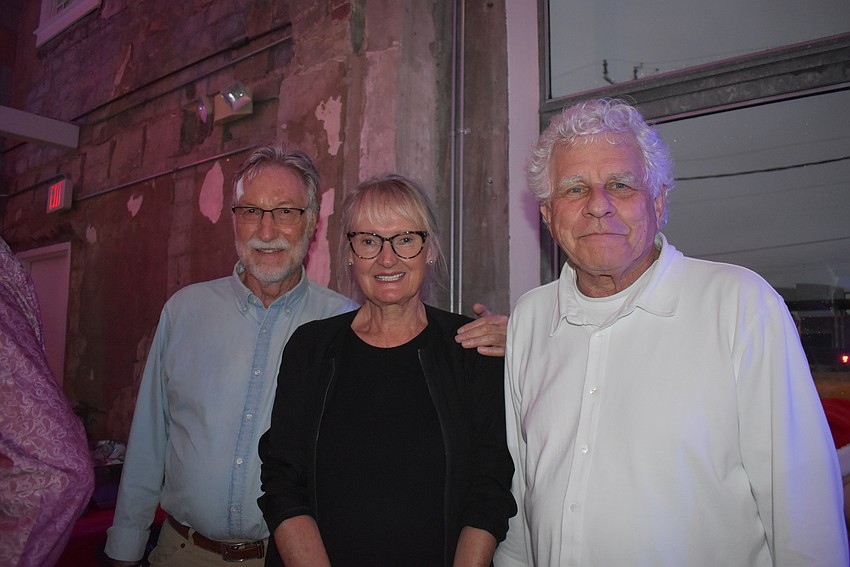Ulrich and Mimi Gunthart with David Lough watch the live performance by Sarasota Music Conservatory.