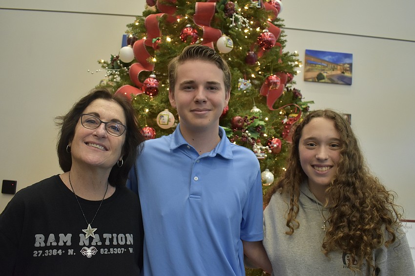 Riverview High School English teacher Deb Bryan and her two students Sebastian Girstl and Annabelle Ramalho.