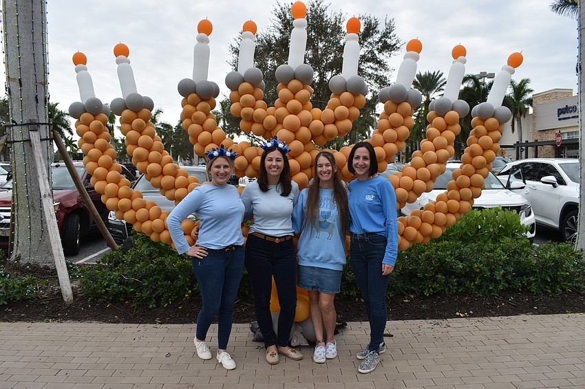 Julie Fanning and Jaime Baum of Benderson Development's marketing staff, and Temple Emanu-El staff Rabbi Elaine Rose Glickman and Rachel Benderson, helped create the event.