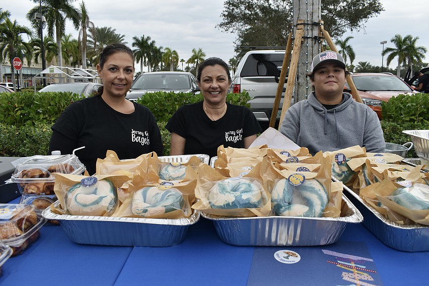 Kim Fishman and Pina Schott of Jersey Girl Bagels, as well as Fishman's 14-year-old son Jake Fishman, offered treats including rugelach and blue-and-white bagels to celebrate Hanukkah.